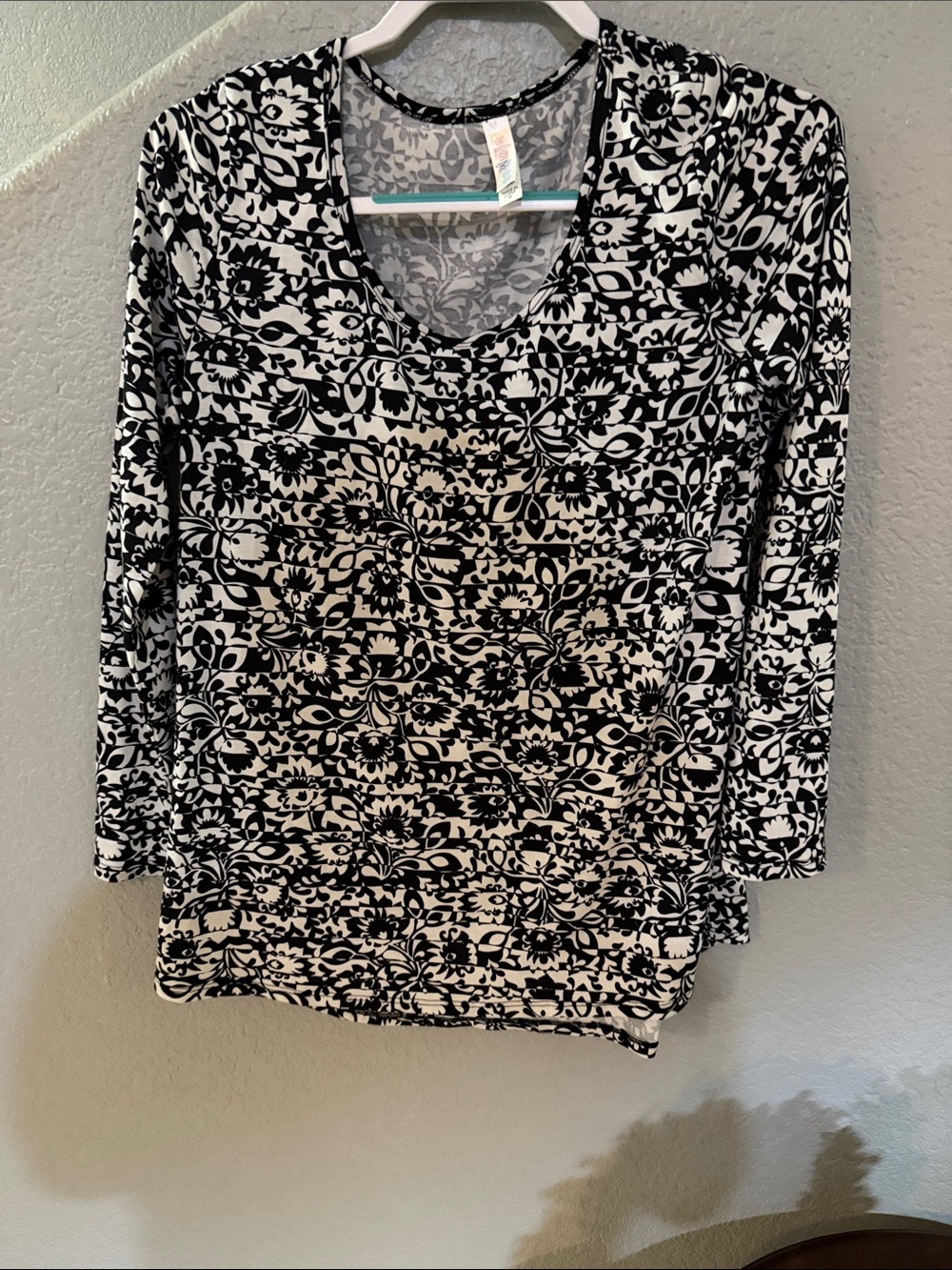 LuLaRoe Black and White Floral V-Neck Top